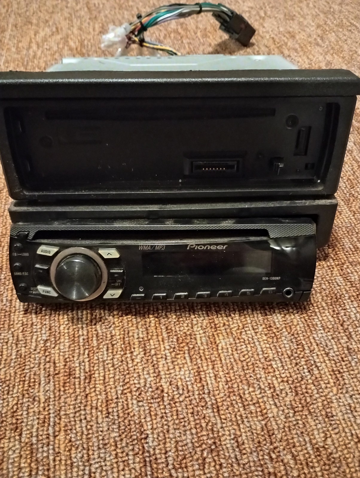 Pioneer DEH-1300MP CD MP3 Car Stereo Radio w/ Wire Harness & Trim Bezel.