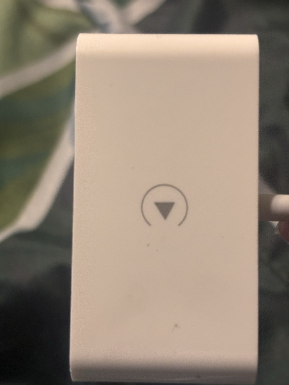 Apple CarPlay adapter used to convert a wired CarPlay system to a wireless one.