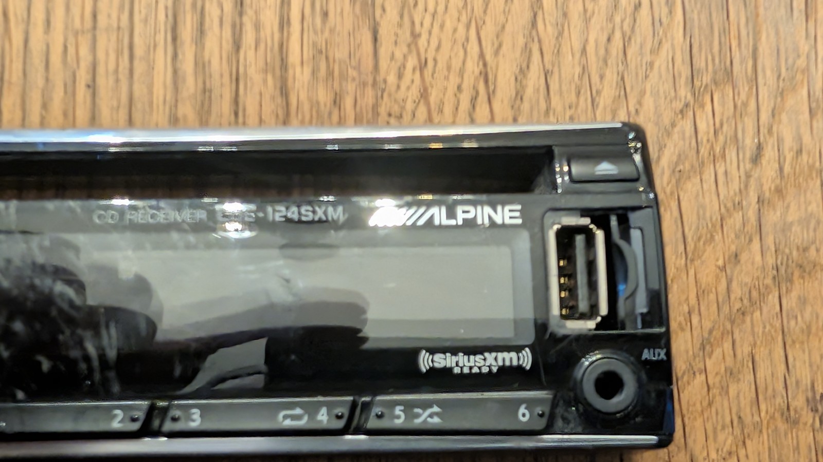 Alpine CDE 124SXM CD Player Radio FACEPLATE ONLY