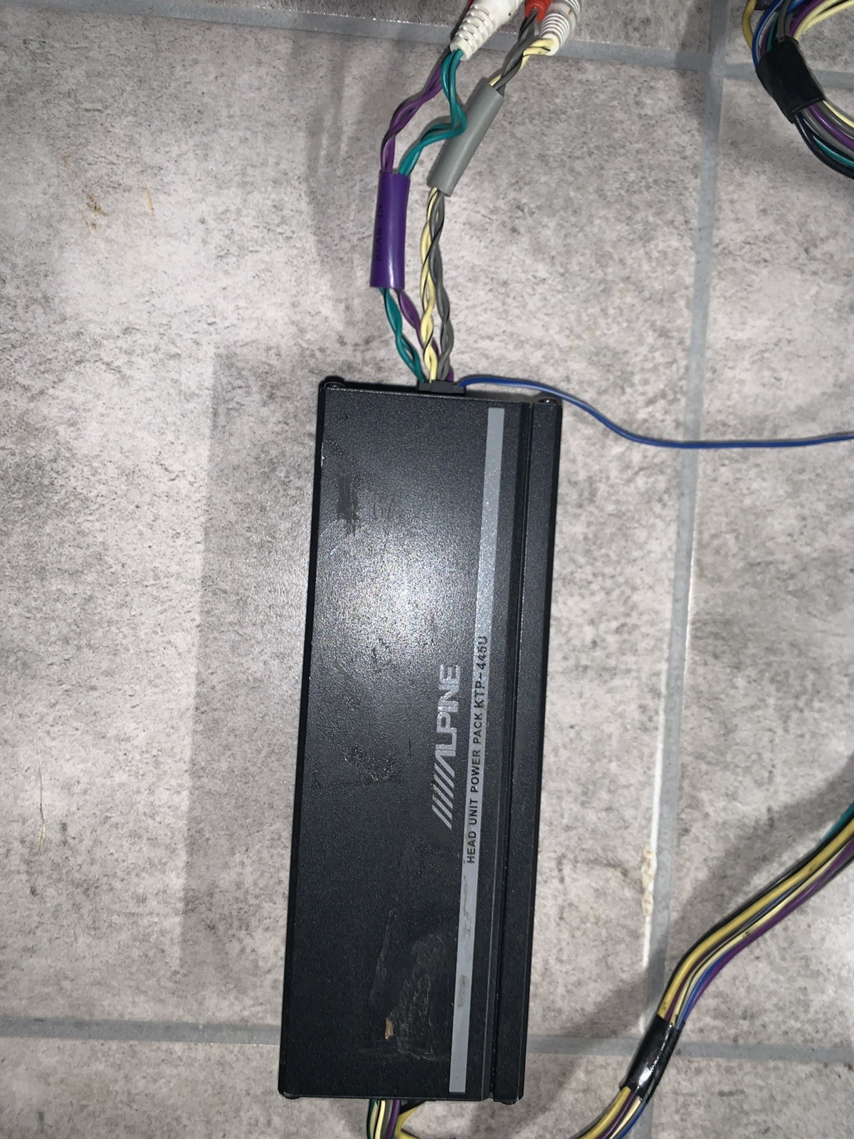 Alpine KTP-445U Power Pack: Compact 4-channel amplifier-45 watts RMS X 4