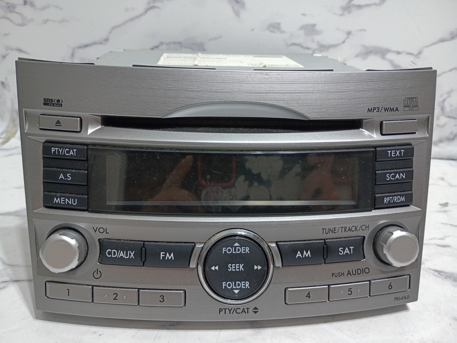 Subaru Legacy / Outback OEM CD MP3 WMAw/ OEM Mounting Brackets & Metra Dash Kit