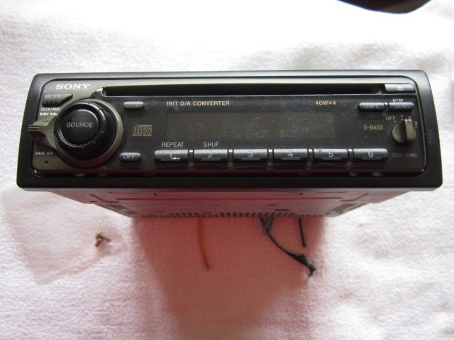 Sony: CDX-2180, FM/AM, Compact, CD Disc. Powers up, accepts CD. No Volume. Parts