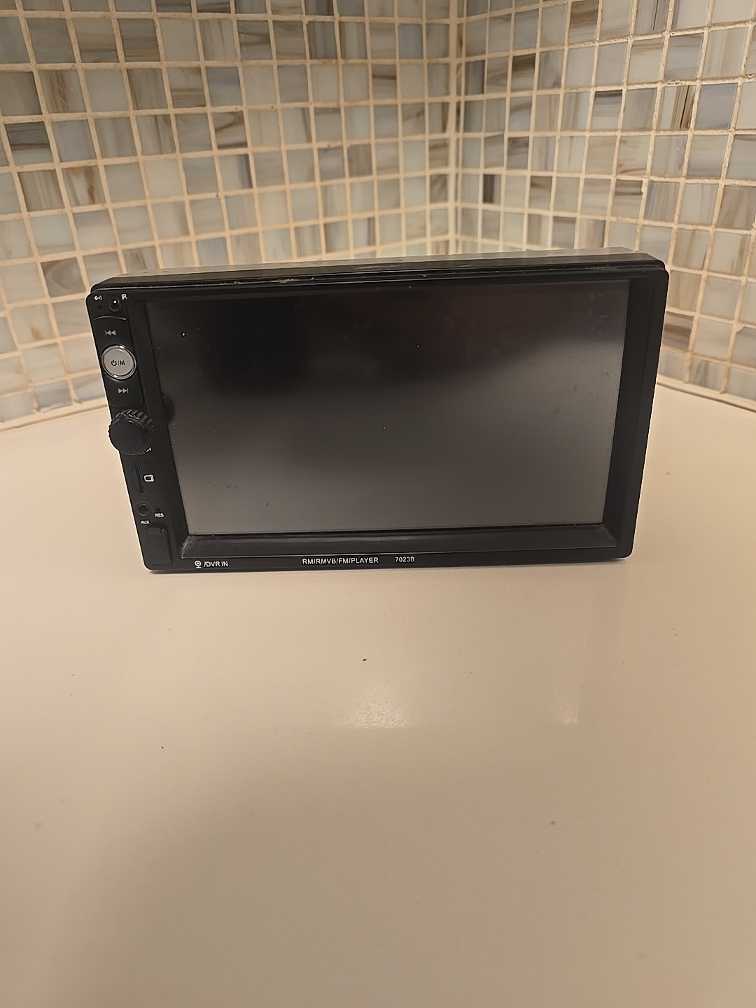 Multimedia RM/RMVB/BT/FM Player headunit model 7023B