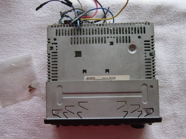 Sony: CDX-2180, FM/AM, Compact, CD Disc. Powers up, accepts CD. No Volume. Parts