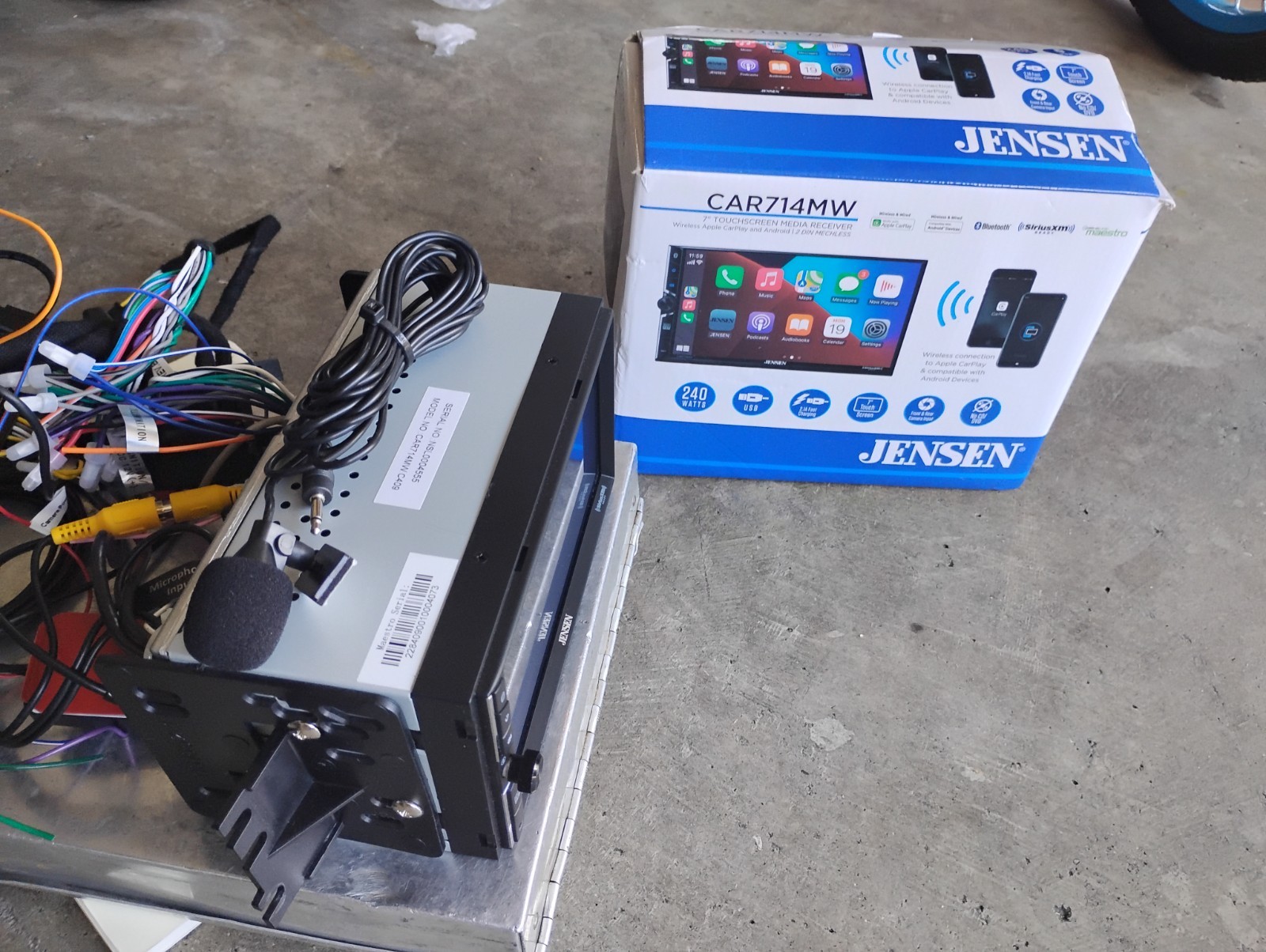 Car radio Jensen with harness and Sirius XM Connect Tuner. 7 inch touchscreen.