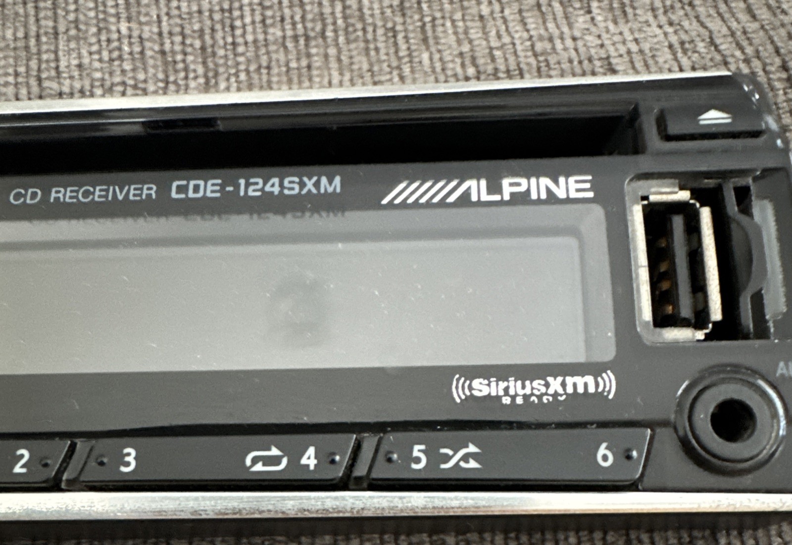 Alpine CDE-124SXM CD Player Stereo *FACEPLATE ONLY* Tested Working