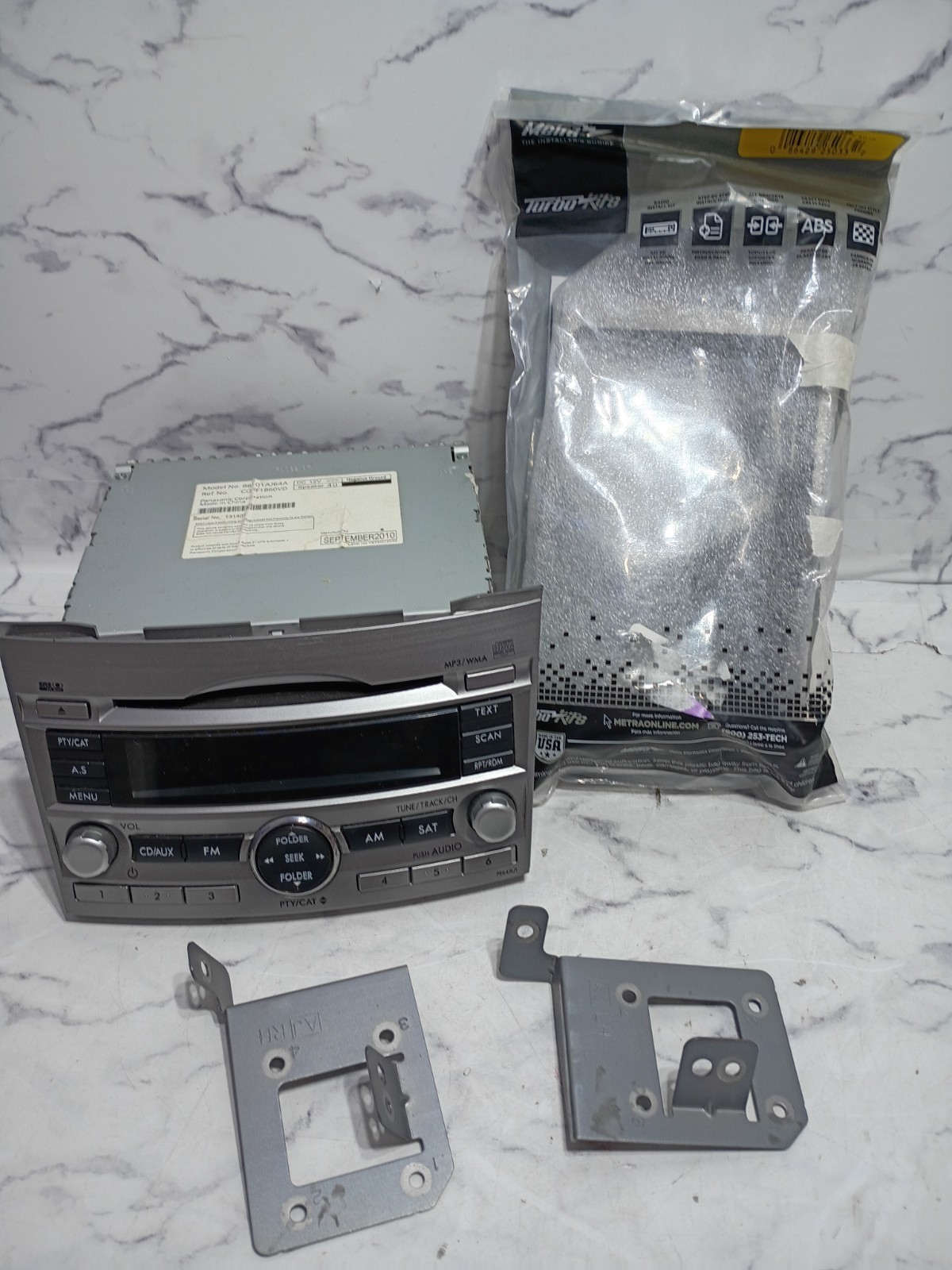 Subaru Legacy / Outback OEM CD MP3 WMAw/ OEM Mounting Brackets & Metra Dash Kit