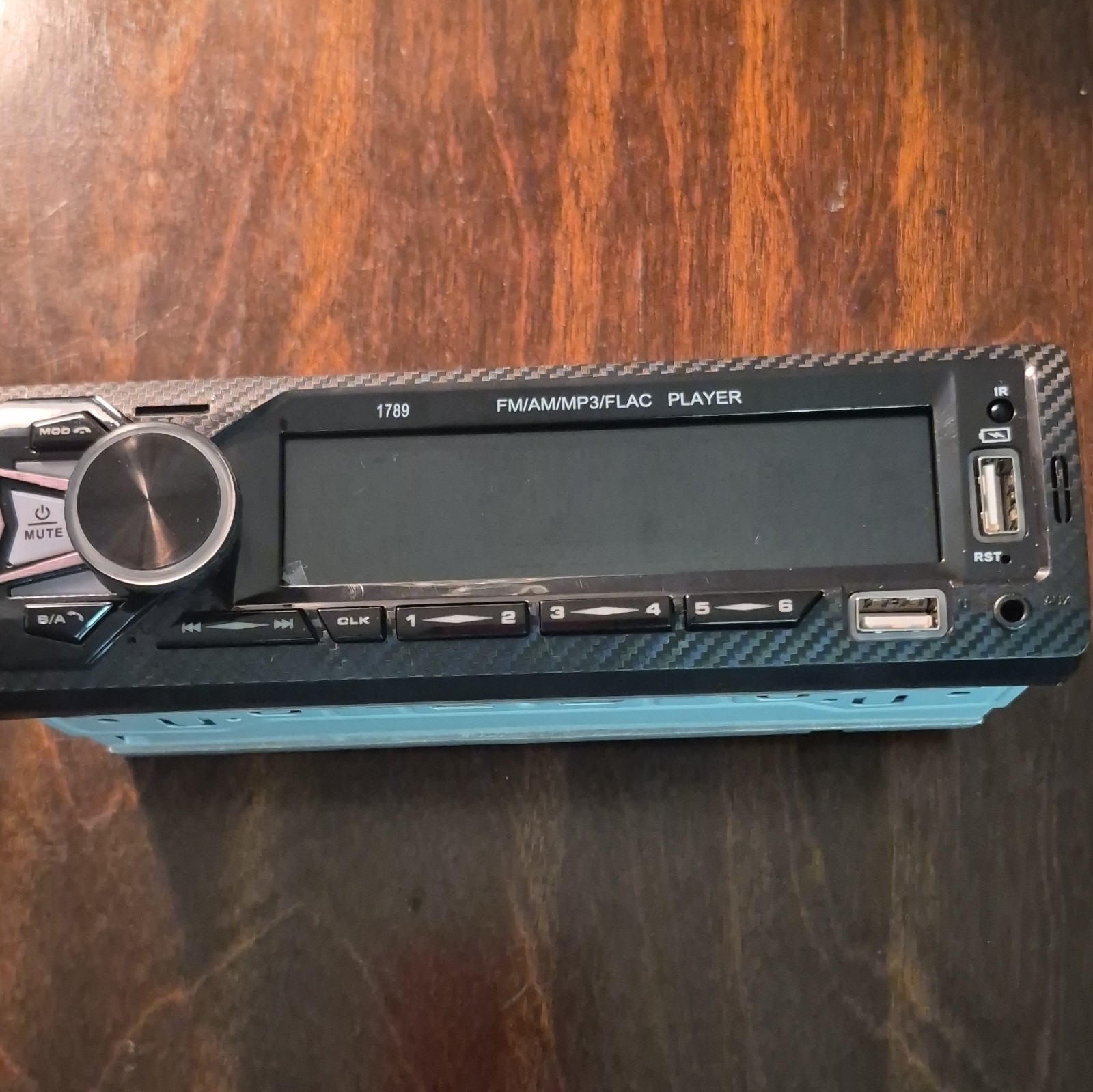This Is a 1 DIN car stereo radio with FM/AM/MP3/FLAC support.