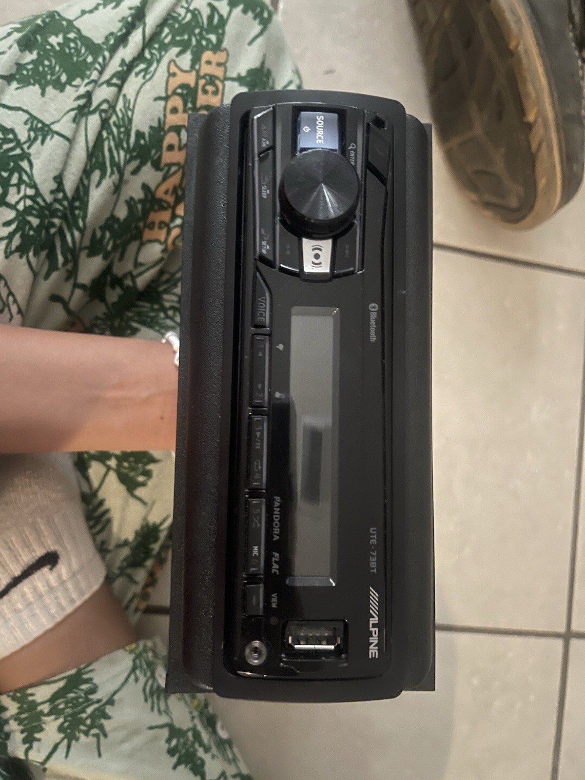 Alpine UTE-73BT digital media receiver, designed for car audio systems.