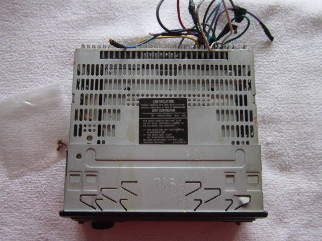 Sony: CDX-2180, FM/AM, Compact, CD Disc. Powers up, accepts CD. No Volume. Parts