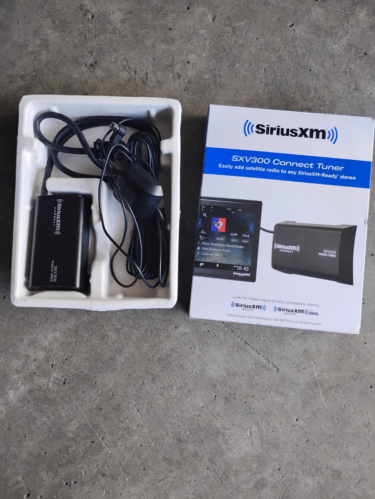 Car radio Jensen with harness and Sirius XM Connect Tuner. 7 inch touchscreen.