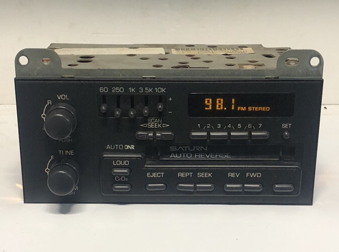 91-94 Saturn AM FM In-dash Radio with Reversible Cassette Full Lighted 21020541
