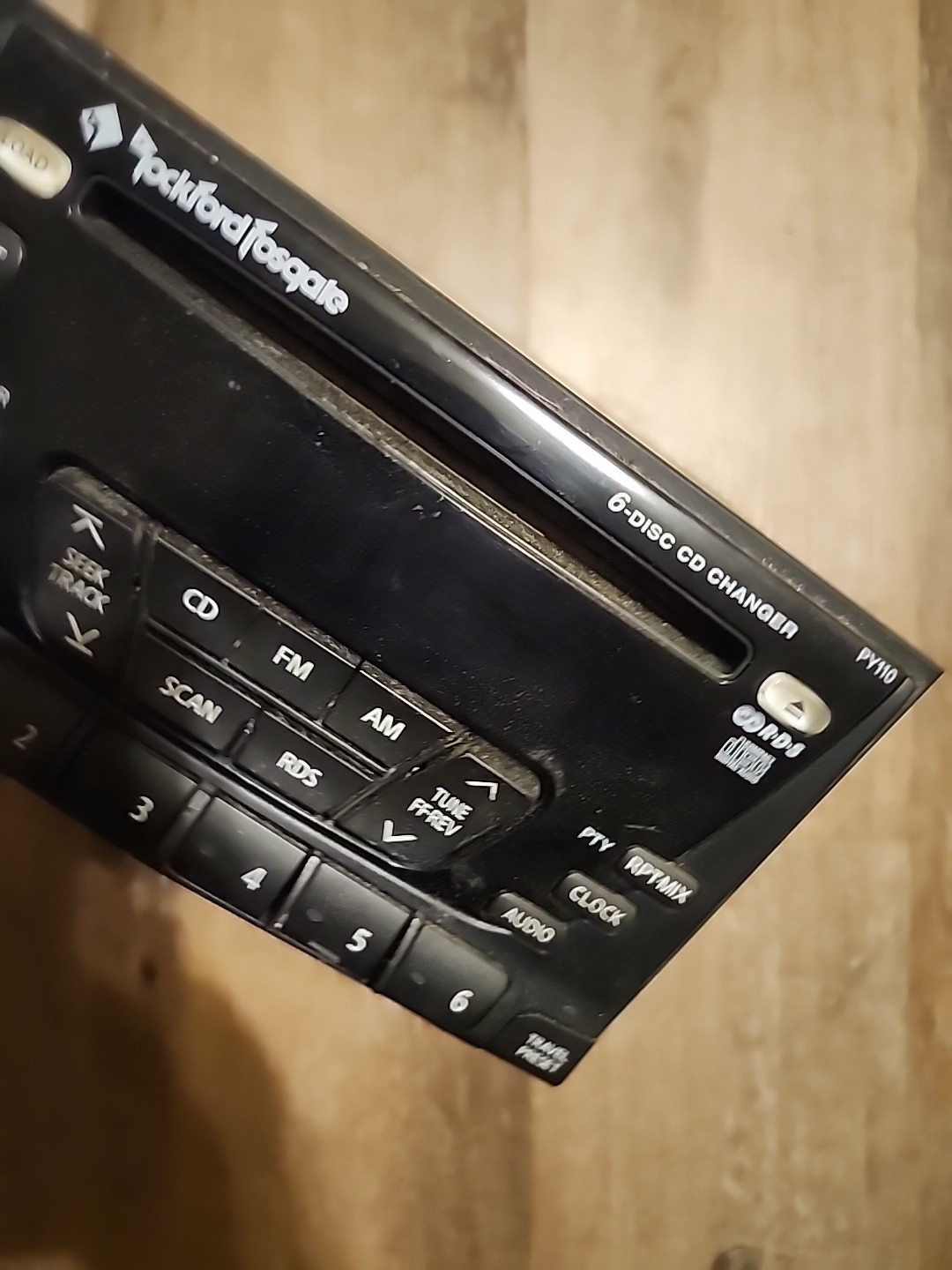 02-04 Nissan Xterra Frontier AM FM six-disc CD radio receiver Rockford Fosgate.