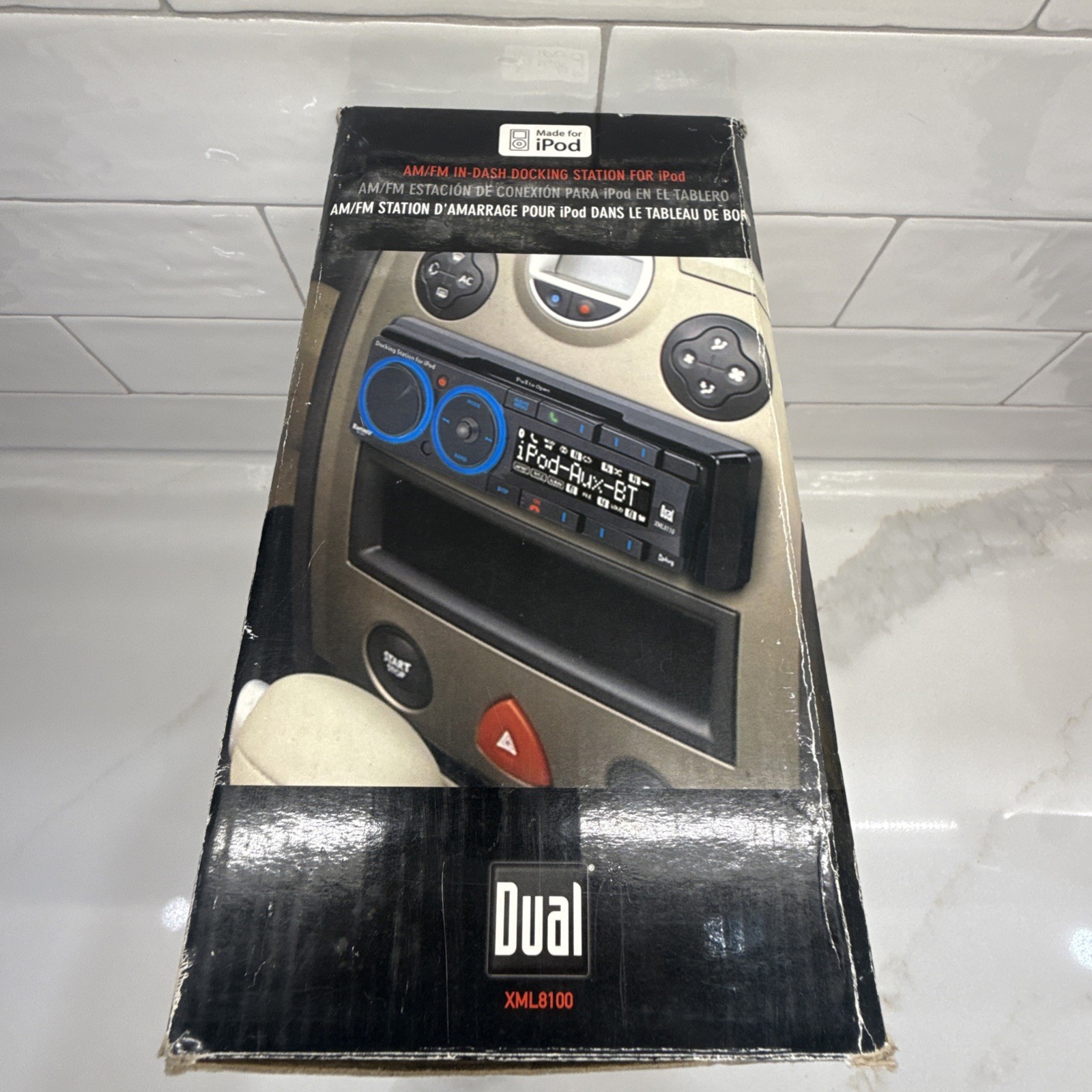 Dual Electronics XML8100 AM/FM Car Dashboard Mechless Receiver with iPod Docking