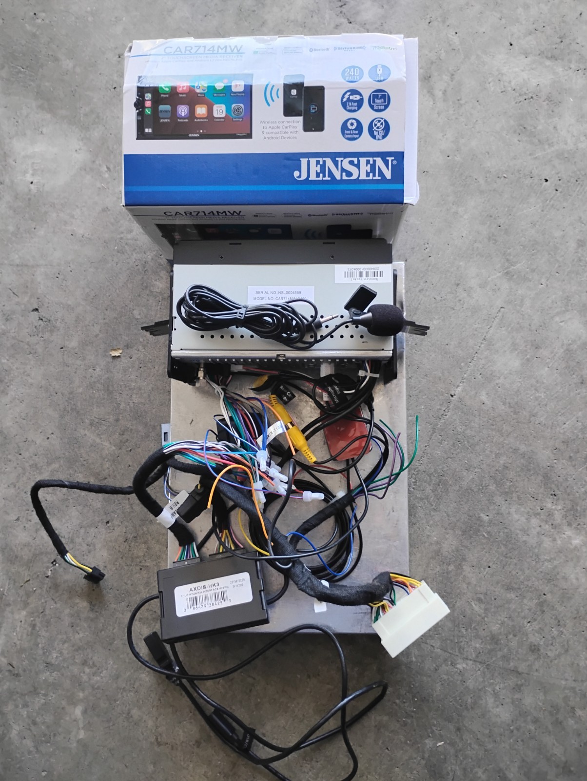 Car radio Jensen with harness and Sirius XM Connect Tuner. 7 inch touchscreen.