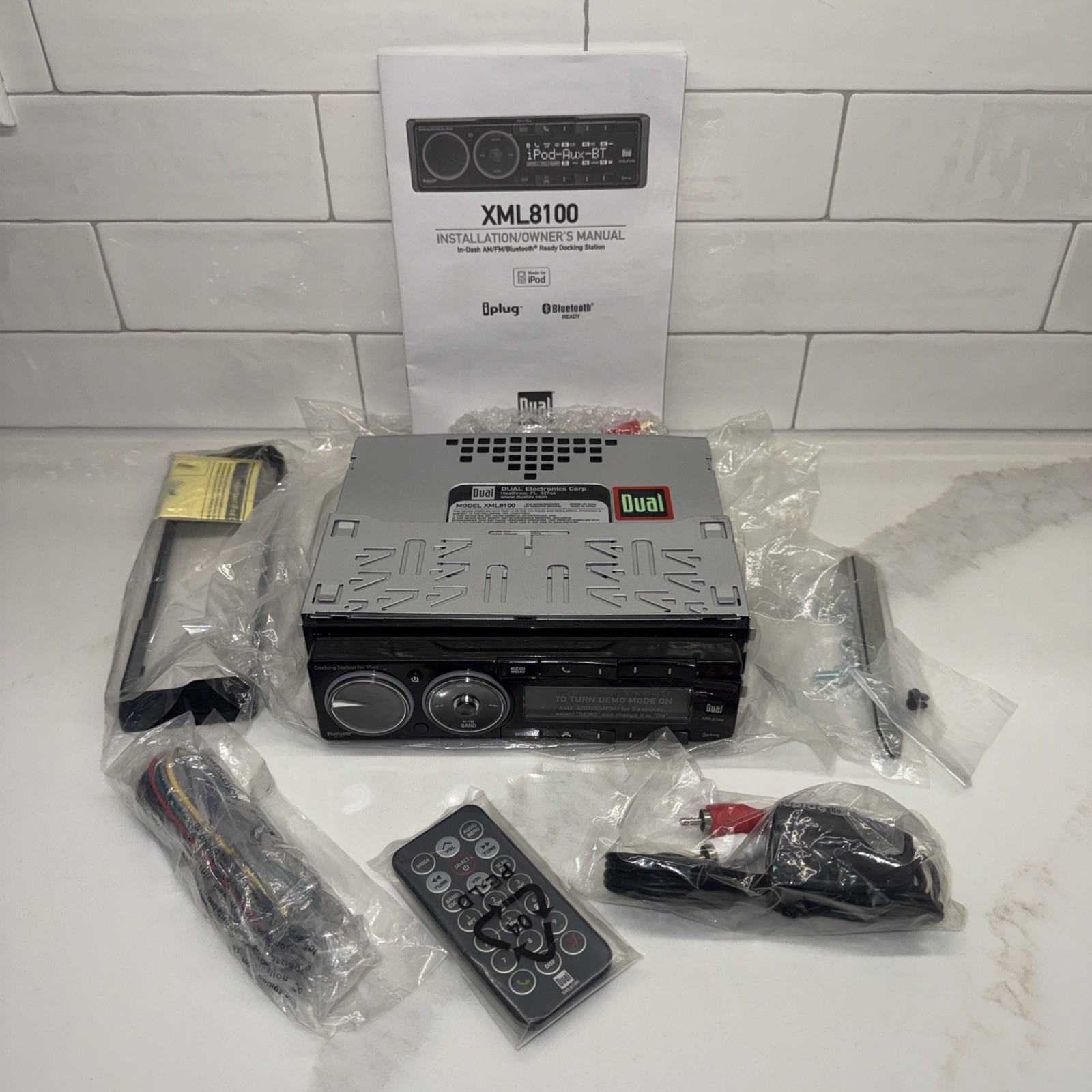 Dual Electronics XML8100 AM/FM Car Dashboard Mechless Receiver with iPod Docking