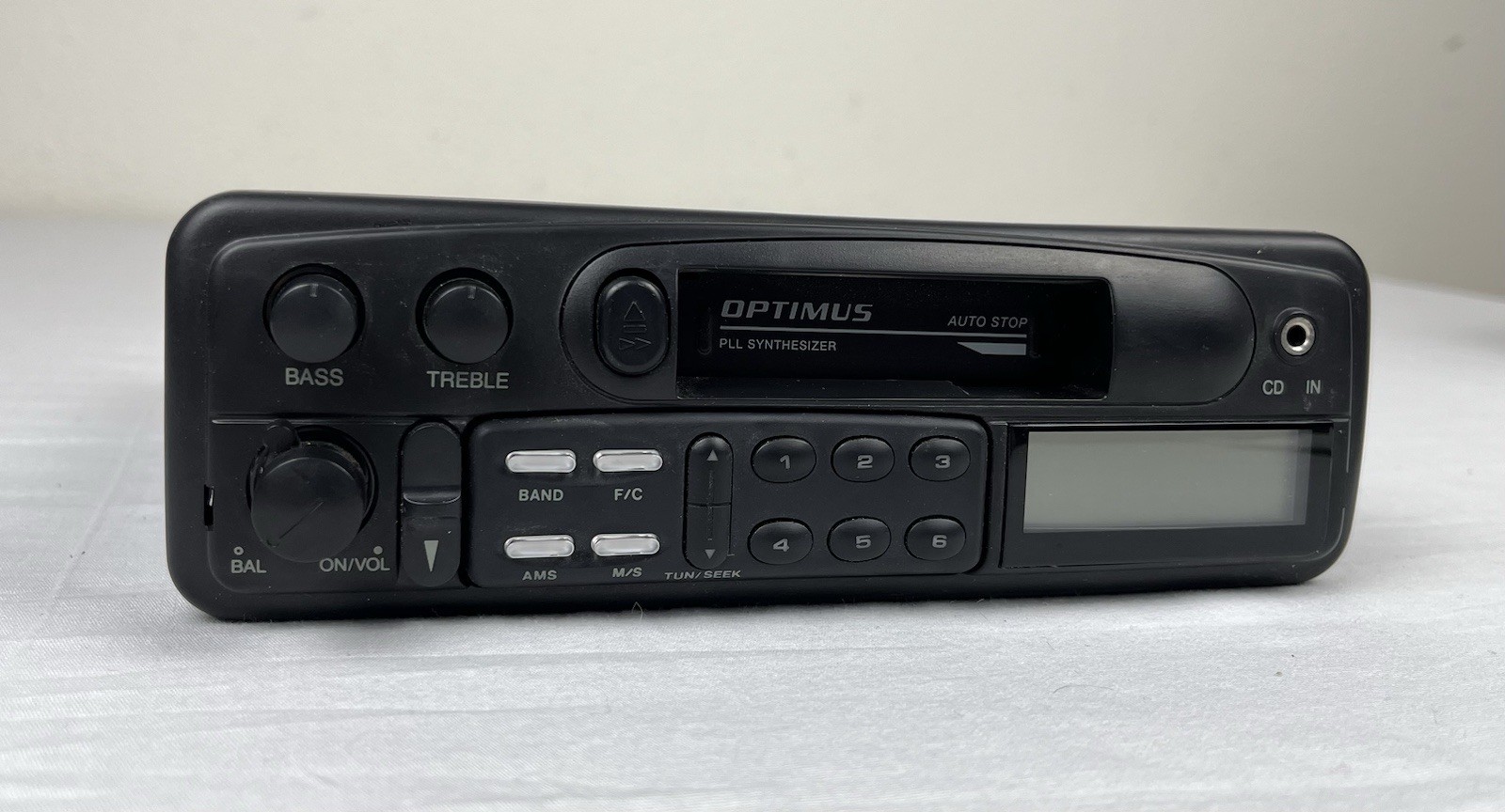 Optimus AM/FM Stereo Cassette with Auto Stop In Dash Detachable Face 12-1998A