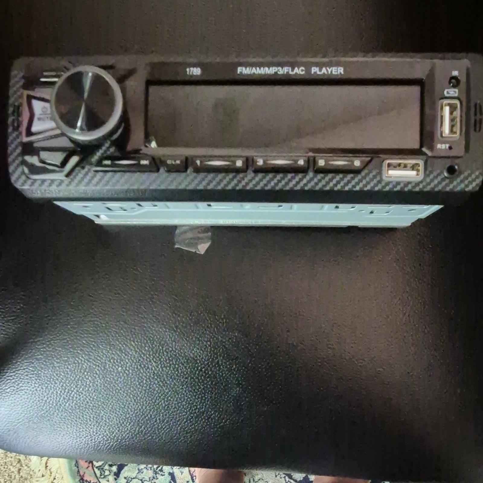 This Is a 1 DIN car stereo radio with FM/AM/MP3/FLAC support.