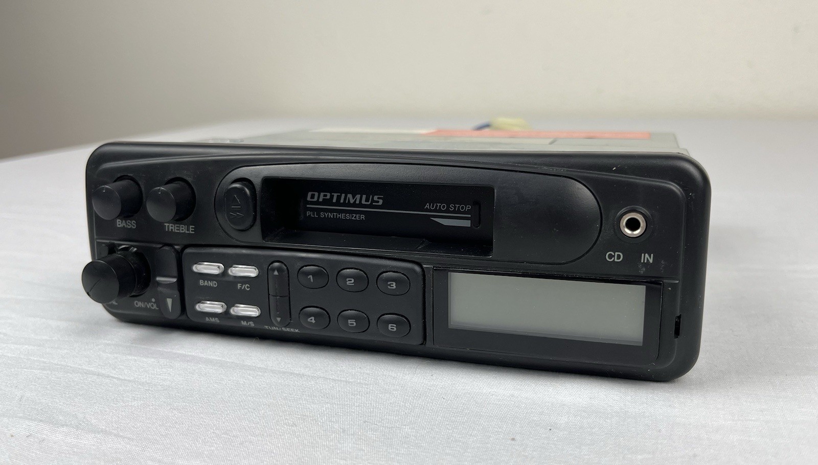 Optimus AM/FM Stereo Cassette with Auto Stop In Dash Detachable Face 12-1998A