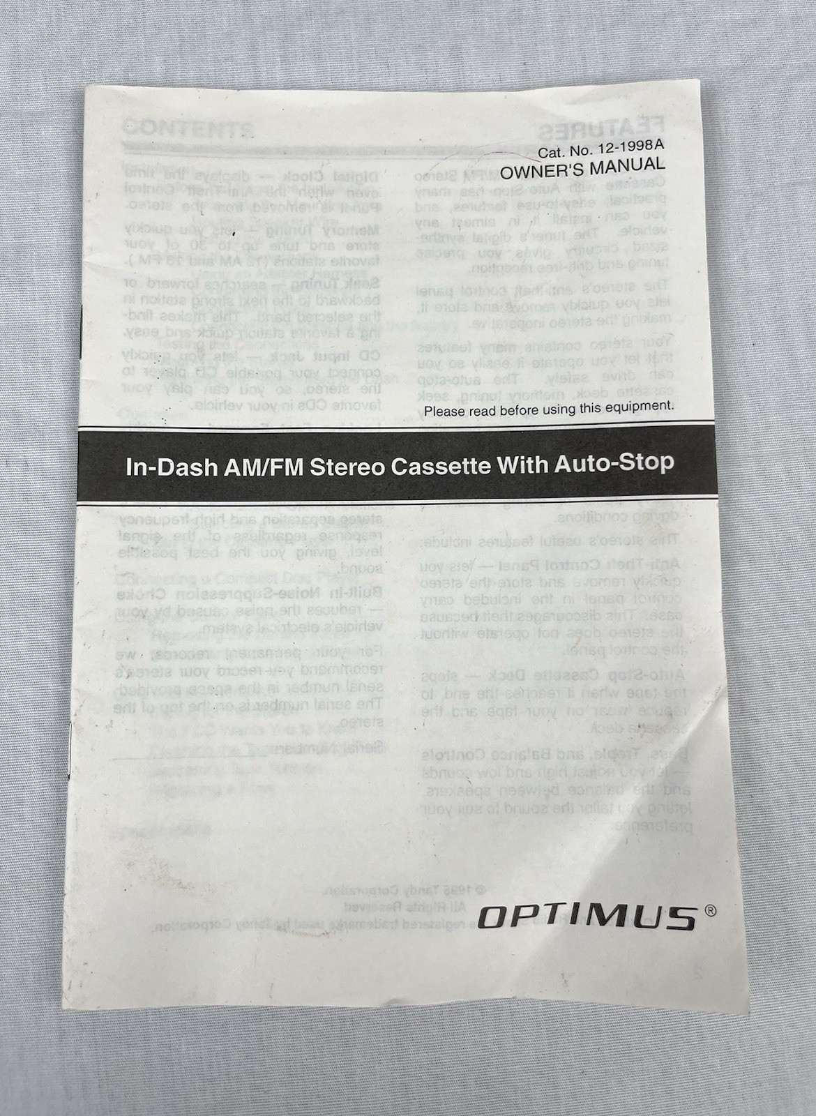 Optimus AM/FM Stereo Cassette with Auto Stop In Dash Detachable Face 12-1998A