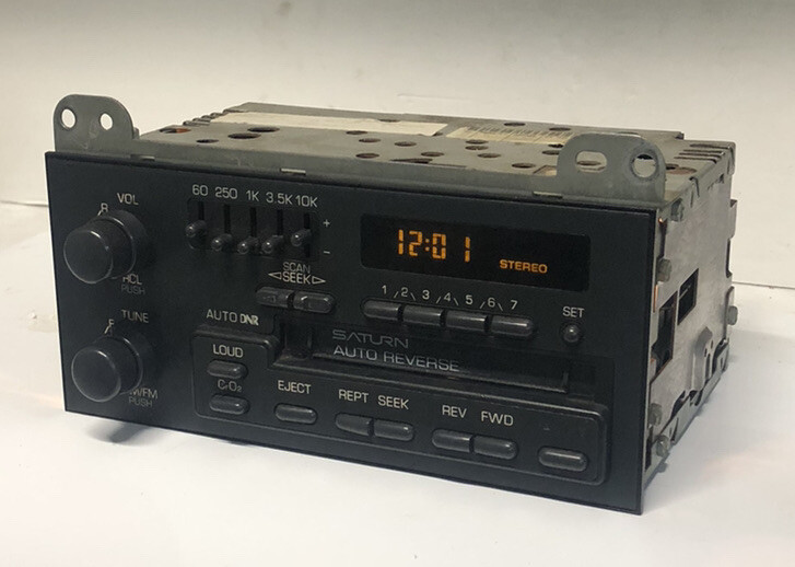 91-94 Saturn AM FM In-dash Radio with Reversible Cassette Full Lighted 21020541
