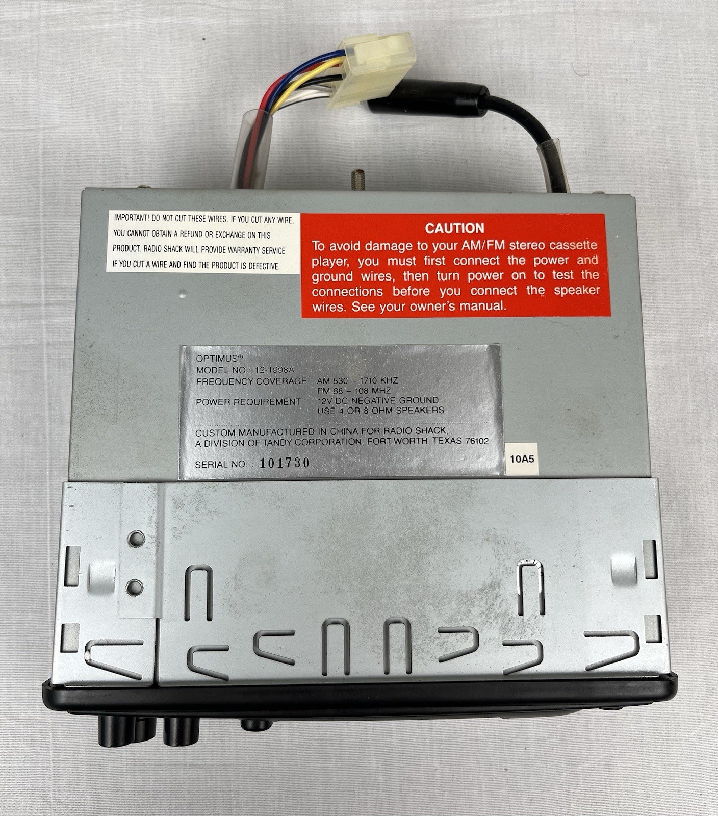 Optimus AM/FM Stereo Cassette with Auto Stop In Dash Detachable Face 12-1998A