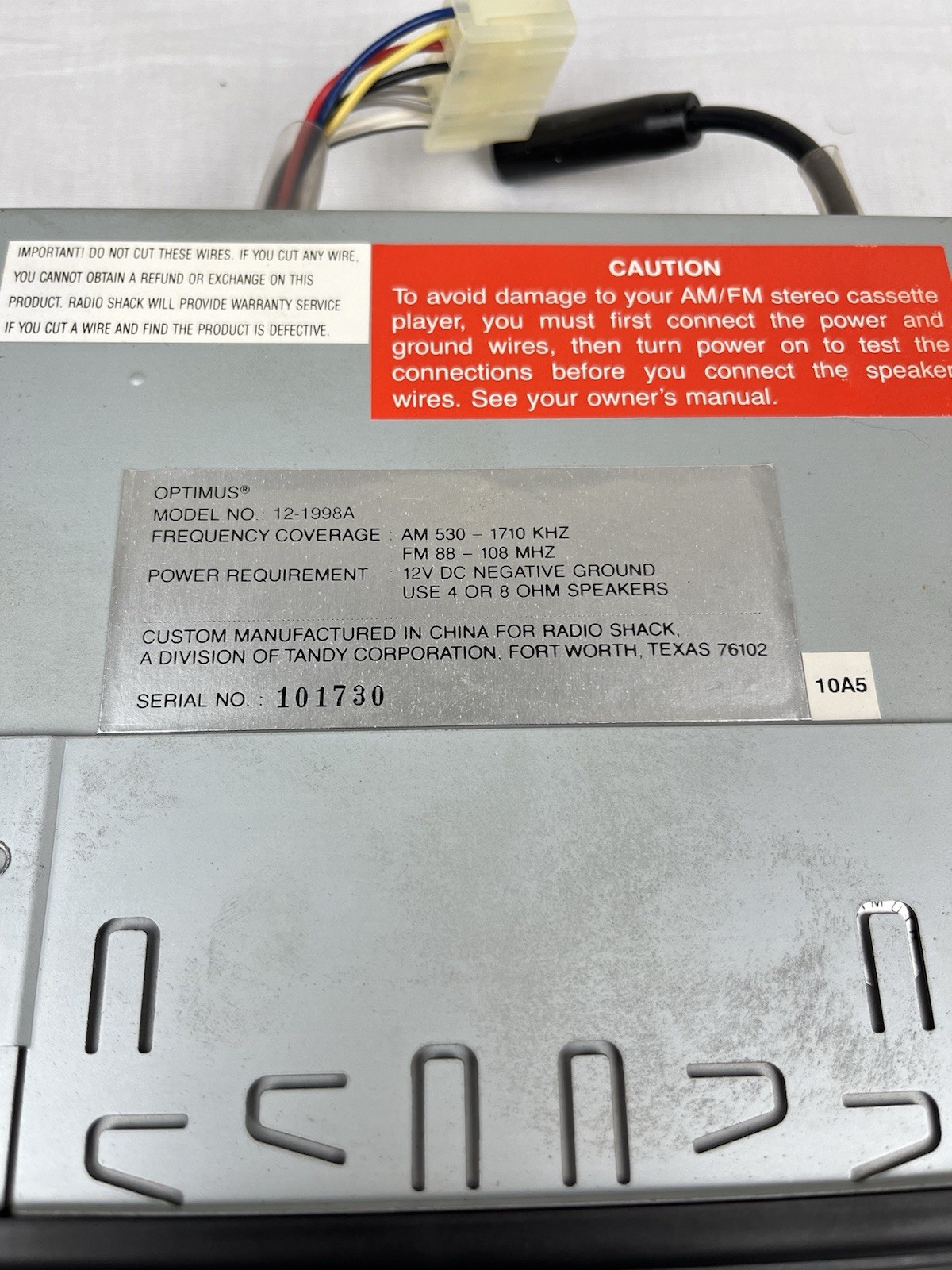 Optimus AM/FM Stereo Cassette with Auto Stop In Dash Detachable Face 12-1998A