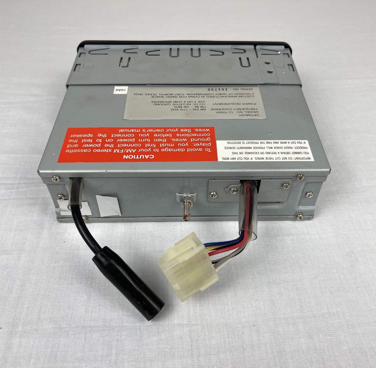 Optimus AM/FM Stereo Cassette with Auto Stop In Dash Detachable Face 12-1998A