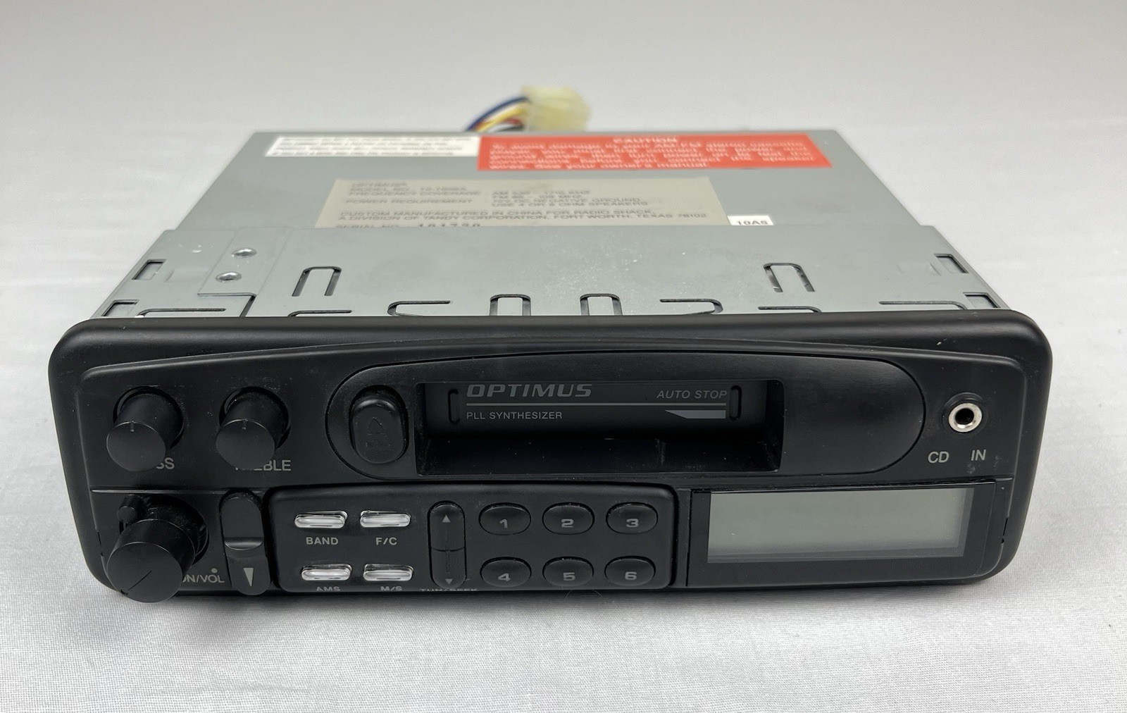 Optimus AM/FM Stereo Cassette with Auto Stop In Dash Detachable Face 12-1998A