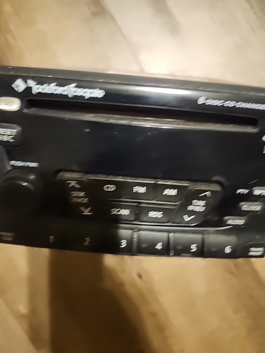 02-04 Nissan Xterra Frontier AM FM six-disc CD radio receiver Rockford Fosgate.