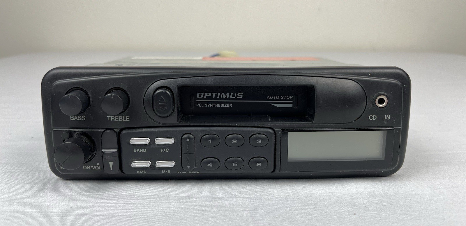Optimus AM/FM Stereo Cassette with Auto Stop In Dash Detachable Face 12-1998A