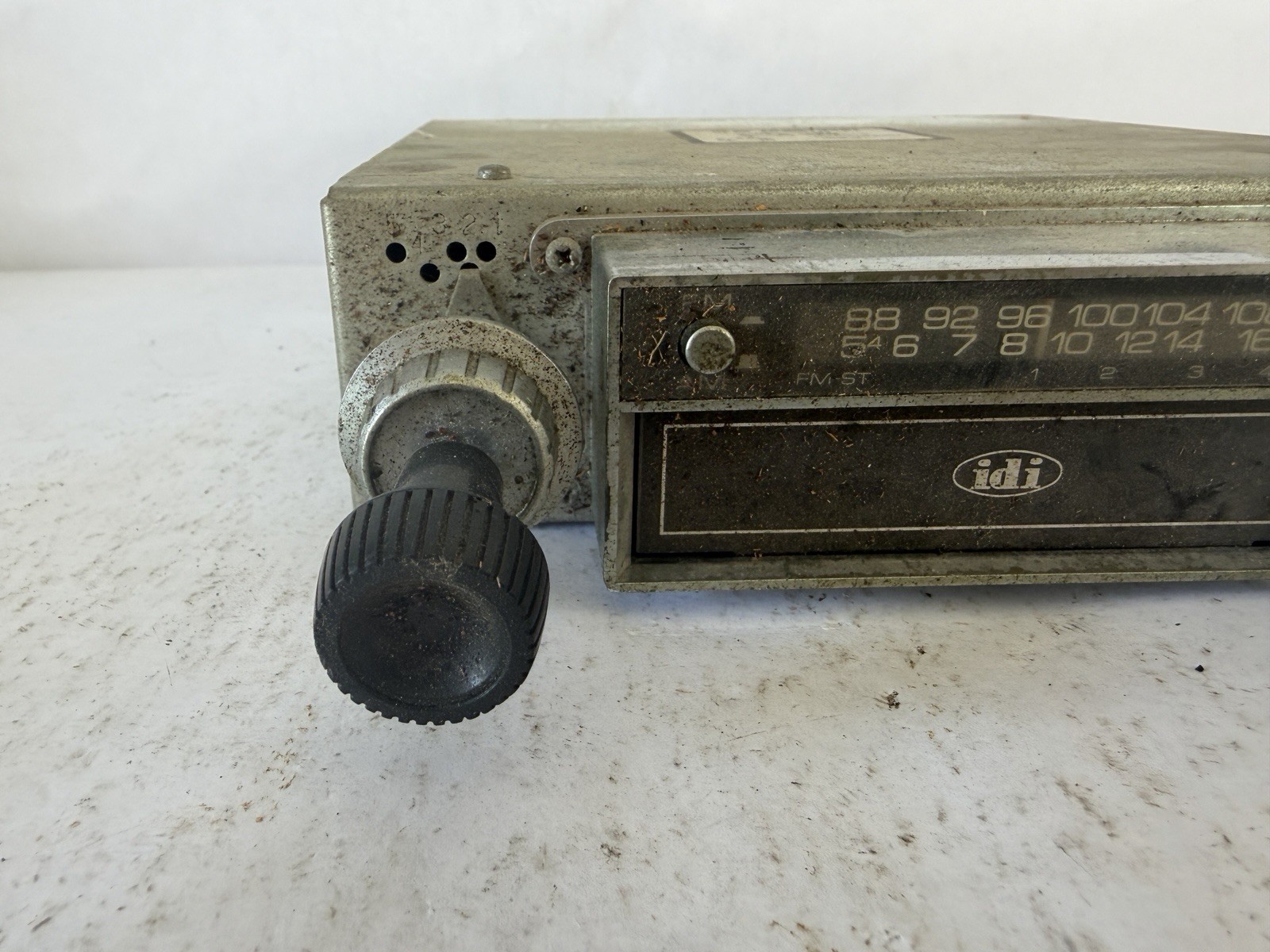 Inland Dynatronics Inc. vintage in-dash car stereo with an 8-track player