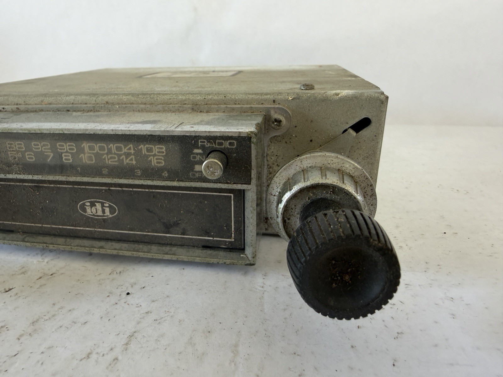 Inland Dynatronics Inc. vintage in-dash car stereo with an 8-track player